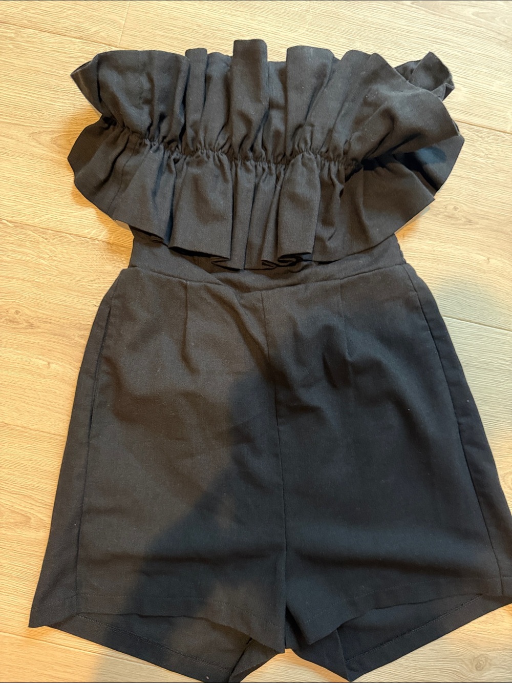 Lush Black Ruffle Strapless Romper
